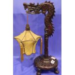 Chinese hardwood dragon lamp with shade, H: 53 cm. No plug, not working at lotting. Not available
