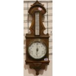 W Watson & Sons, London; an oak cased aneroid barometer with mercury stick thermometer and ceramic