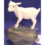 Royal Copenhagen goat kid on rock figurine, H: 12 cm. P&P Group 2 (£18+VAT for the first lot and £
