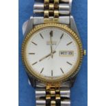 Seiko stainless steel day date wristwatch with gold tone bezel and matching bracelet. P&P Group