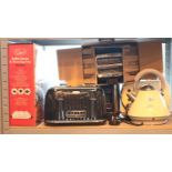 Shelf of Breville and Morphy Richards toasters, some unused with kettle and buffet warmer. Not