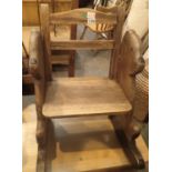 Heavy oak childs rocking chair in the form of a bear. Not available for in-house P&P, contact Paul