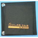 New old stock, 6 watt folding solar panel pack with one USB charging output. Integral part of case