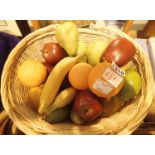 A shopping basket containing and a selection of artificial fruit. Not available for in-house P&P,