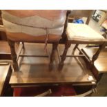 Vintage drawleaf extending dining table with five matching chairs and a sideboard. Not available for