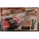 A boxed real FX slotless racing set. Not available for in-house P&P, contact Paul O'Hea at Mailboxes