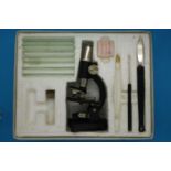Boxed childs Merit microscope set. P&P Group 1 (£14+VAT for the first lot and £1+VAT for