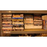 A large quantity of mixed DVDs mainly film and a Sky Plus box. Not available for in-house P&P,