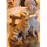 Large Continental bisque figurine of a young girl with a dog, H: 38 cm. Not available for in-house