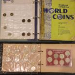 A small collection of UK and world coins, housed in two part-filled albums, together with empty coin