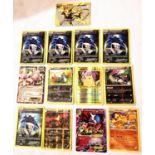 Collection of assorted shiny / holographic Pokemon trading cards including; Pikachu 35/108 (original