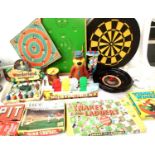 Selection of vintage games including dartboard, hoopla, shooting gallery, roulette wheel,