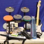 Band Hero and Guitar Hero mixed components some for Xbox or Playstation together with a Fender