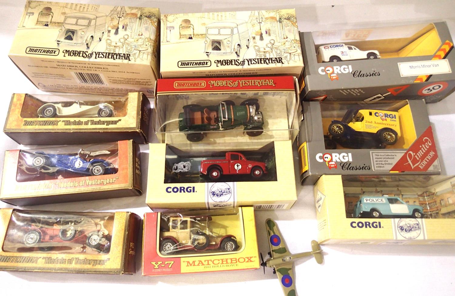 Eleven mixed boxed diecast vehicles and Tomka a Hurricane. P&P Group 2 (£18+VAT for the first lot
