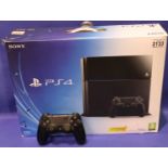 Sony Playstation 4 console, boxed with two controllers, HDMI, manuals and power pack. Outer box