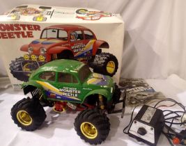 Tamiya monster remote control Beetle with charger, no remote. P&P Group 3 (£25+VAT for the first lot