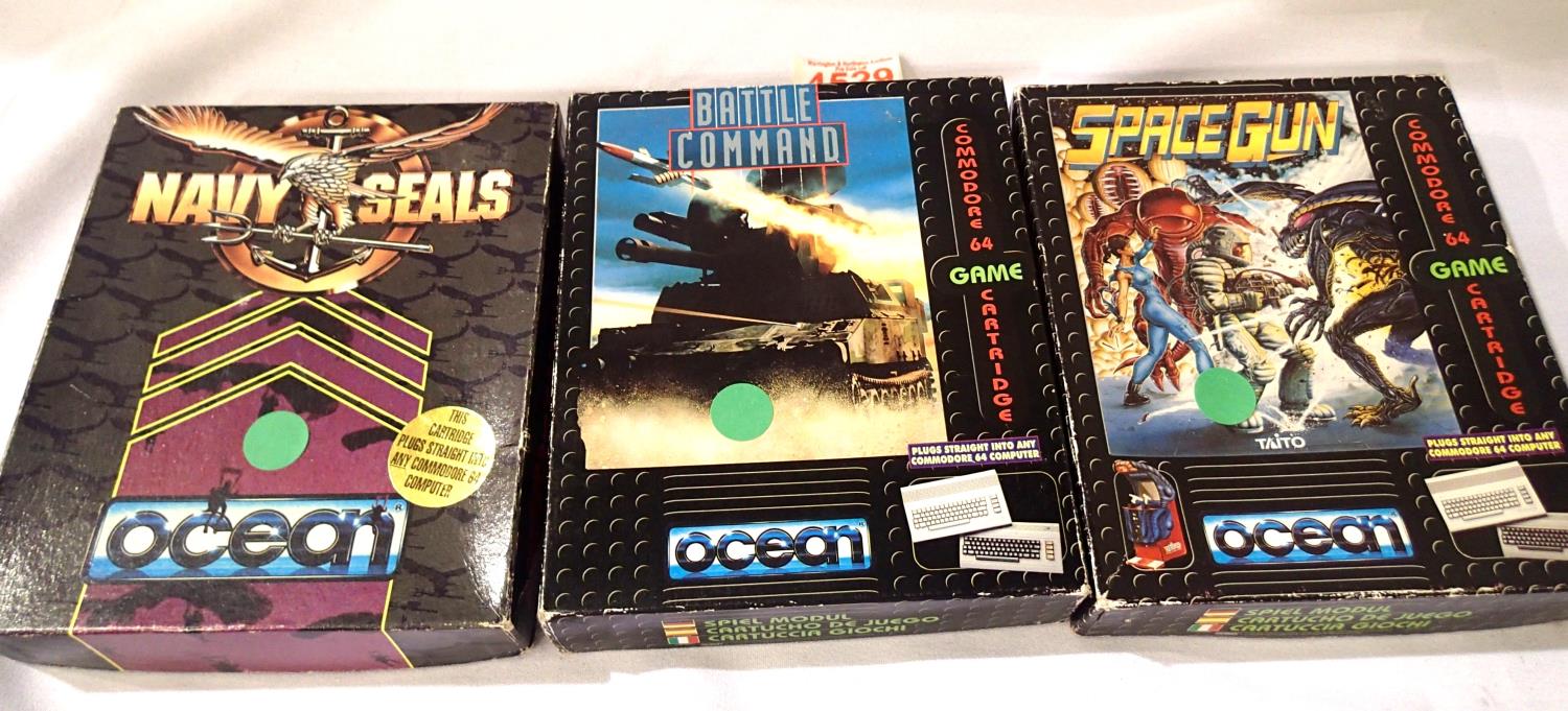 Three commodore boxed games cartridges to include Navy Seals Battle Command and spare gun. P&P Group