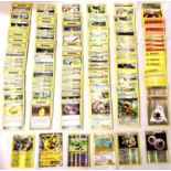 Collection of assorted Basic, Trainer and Energy Pokemon trading cards including shiny / holographic