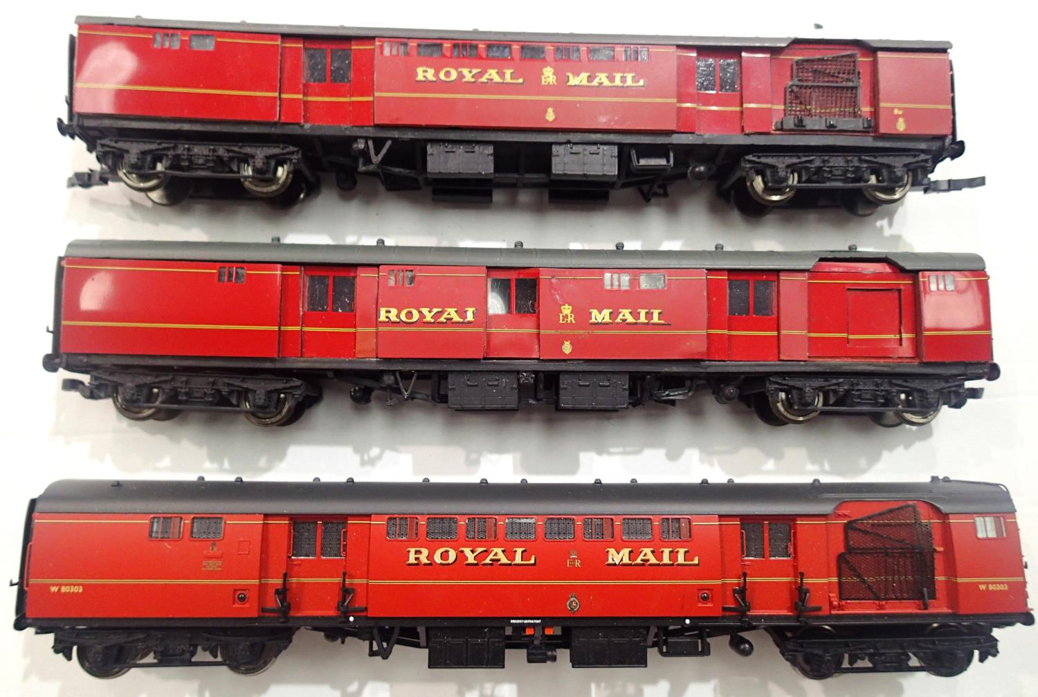 Three Royal Mail T.P.O. coaches, one Bachmann and two Southern Pride mostly in good to very good