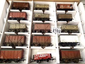 Fifteen OO scale wagons, various types and makes, mostly weathered in Warley storage box. P&P