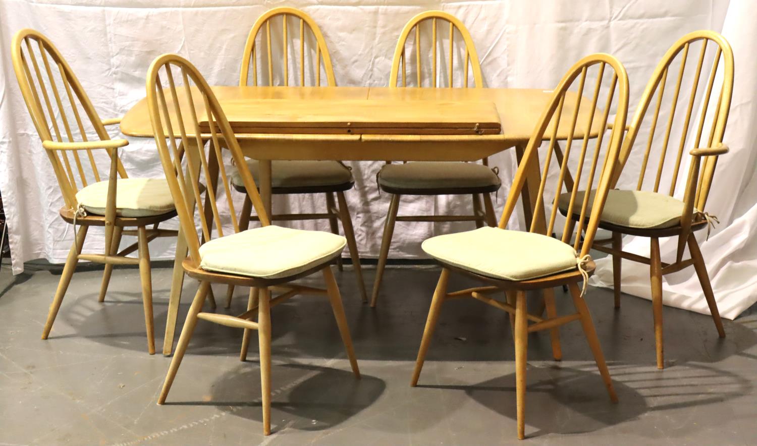 Ercol dining table on square tapering supports with two additional leaves, six dining chairs (4+2)