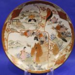 Japanese vintage dish depicting a Geisha in garden, D: 24 cm. Some crazing otherwise no damage. P&