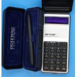 Sinclair Cambridge memory calculator in case and boxed space pen. P&P Group 1 (£14+VAT for the first