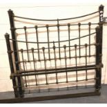 Cast iron Edwardian bedstead, 140 x 194 x 133 cm H. Not available for in-house P&P, contact Paul O'