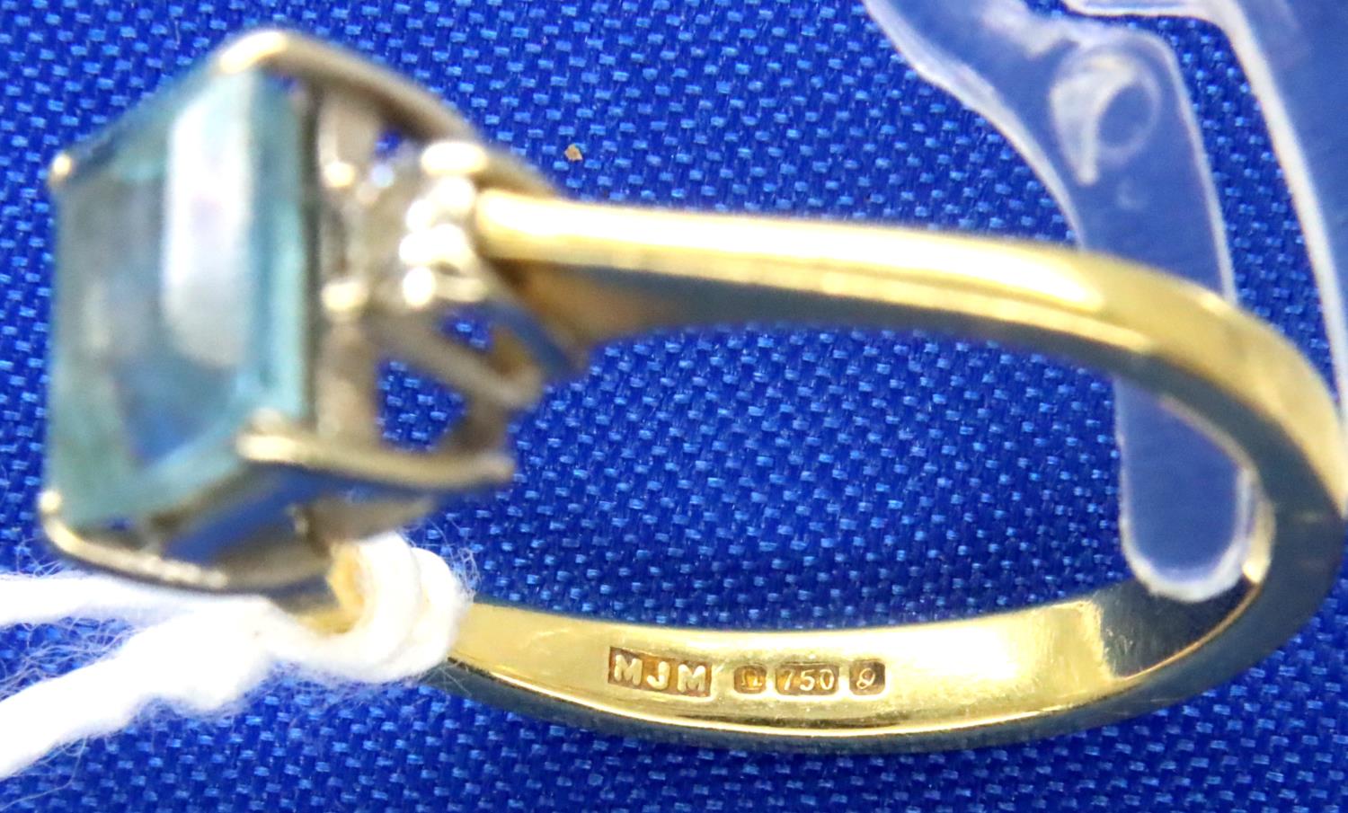 18ct gold emerald cut aquamarine and diamond ring, size K/L, 2.8g. P&P Group 1 (£14+VAT for the - Image 2 of 2