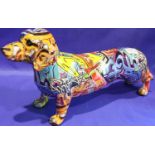 Graffiti Art Dachshund figurine, L: 42 cm. P&P Group 3 (£25+VAT for the first lot and £5+VAT for