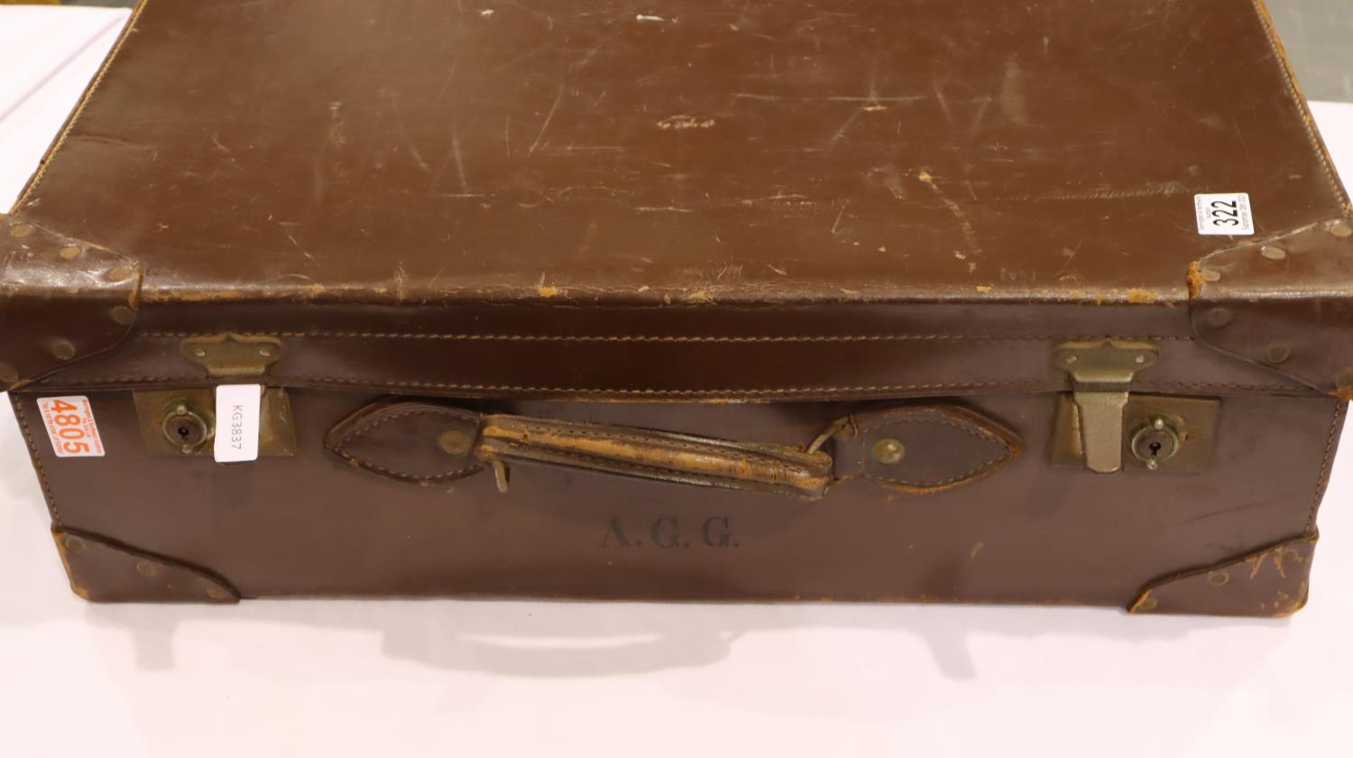 Large brown leather suitcase, stamped A.G.G., 66 x 22 x 40 cm. Not available for in-house P&P, - Image 2 of 6