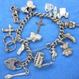 925 silver charm bracelet, fifteen charms, L: 22 cm. P&P Group 1 (£14+VAT for the first lot and £1+