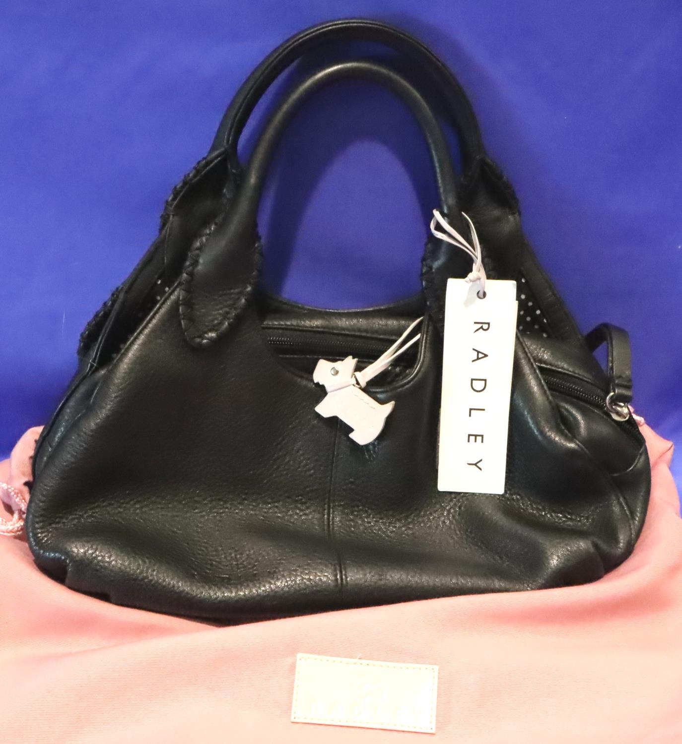 Black leather handbag by Radley, with dust cover and tags, L: 32 cm. P&P Group 2 (£18+VAT for the