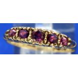 9ct gold ruby set ring, size S/T, 1.6g. P&P Group 1 (£14+VAT for the first lot and £1+VAT for