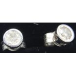 Pair of 9ct white gold diamond set earrings, 0.9g. P&P Group 1 (£14+VAT for the first lot and £1+VAT