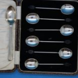 Cased set of six hallmarked silver teaspoons with coffee bean handled and a further spoon. P&P Group