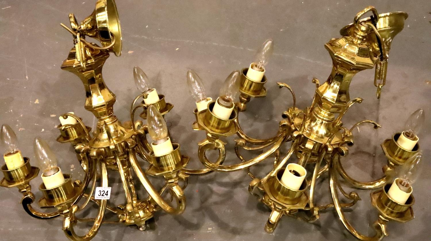 Two large brass ceiling six branch light fittings, L: 53 cm excluding fittings. Not available for