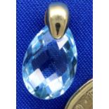 Blue topaz pear cut, teardrop pendant on a 9ct gold mount, 0.5g. P&P Group 1 (£14+VAT for the