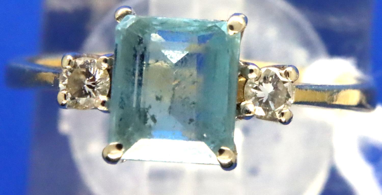 18ct gold emerald cut aquamarine and diamond ring, size K/L, 2.8g. P&P Group 1 (£14+VAT for the