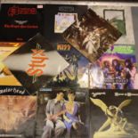 Ten LPS to include Saxon, Led Zeppelin, Whitesnake etc and a ZZ Top 12 inch. P&P Group 3 (£25+VAT
