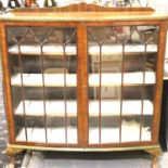 Two door oak display cabinet, 119 x 38 x 125 cm H. Not available for in-house P&P, contact Paul O'