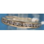 18ct white gold diamond half eternity ring, size K, 2.6g. P&P Group 1 (£14+VAT for the first lot and