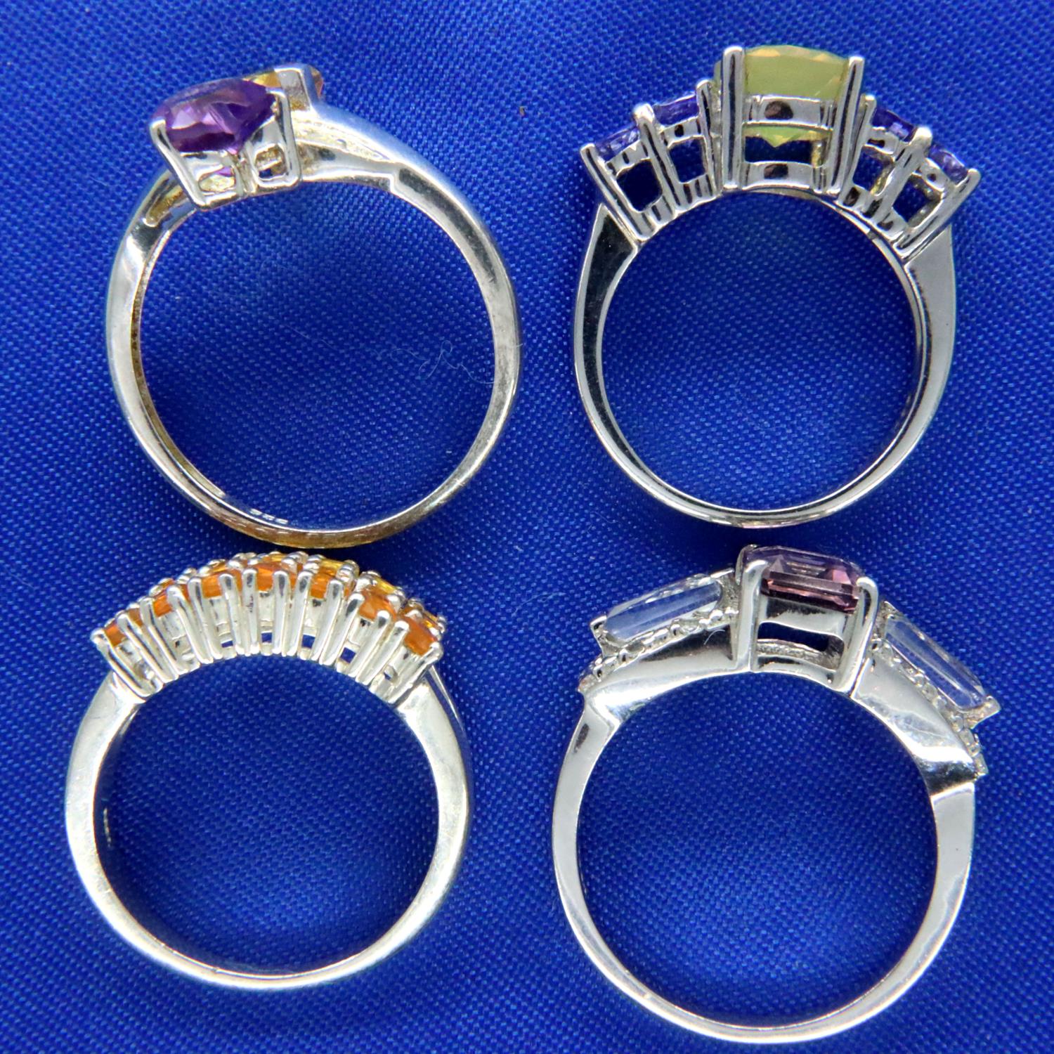 Four stone set sterling silver dress rings. P&P Group 1 (£14+VAT for the first lot and £1+VAT for - Image 2 of 2