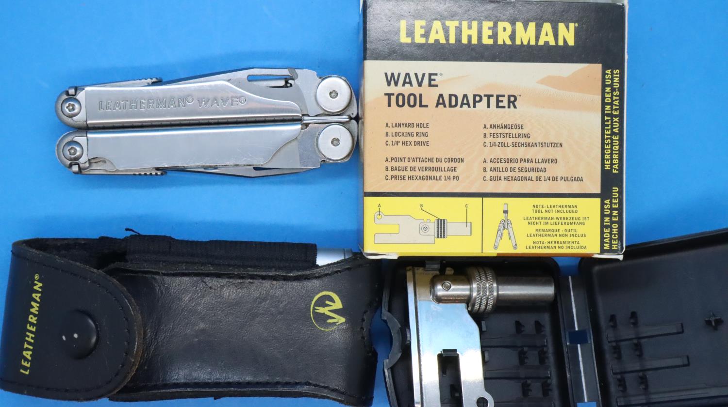 Cased Leatherman Wave multitool with torch and a Wave tool adaptor socket set. P&P Group 2 (£18+