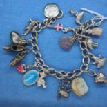 925 silver charm bracelet, 16 charms, L: 17 cm. P&P Group 1 (£14+VAT for the first lot and £1+VAT