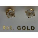 Pair of 9ct gold earring studs with white cut stones, 0.6g. P&P Group 1 (£14+VAT for the first lot