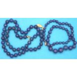 Two Lapis Lazuli bead necklaces, L: 50 cm and L: 40 cm with 9ct gold clasp. P&P Group 1 (£14+VAT for