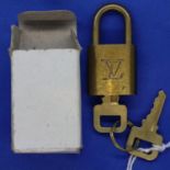 Louis Vuitton padlock. P&P Group 1 (£14+VAT for the first lot and £1+VAT for subsequent lots)