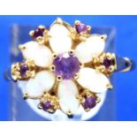 14ct gold flower head set ring of six opals and seven amethysts, size Q/R, 3.3g. P&P Group 1 (£14+