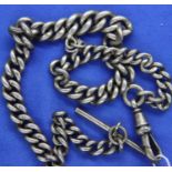 A hallmarked silver graduated single Albert watch chain with lobster clip and T-bar, L: 30 cm,